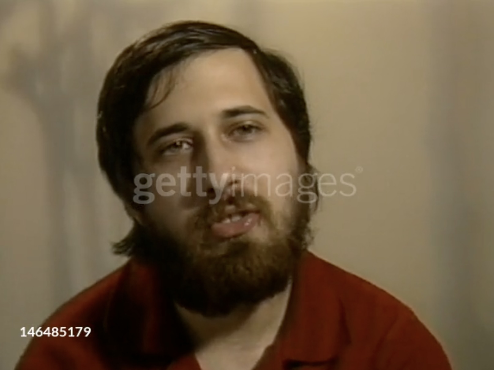 A photo of Stallman speaking during an interview at the hackers conference. The words 'getty images' is superimposed.